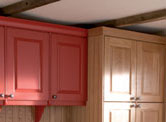 Kitchen in light oak and red